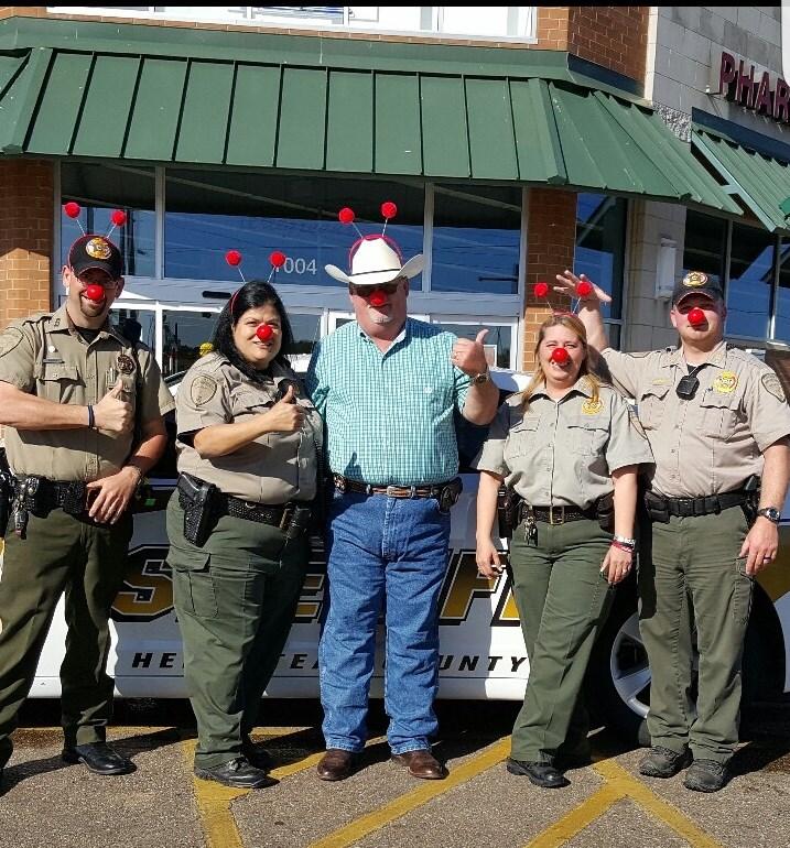Deputies with red noses on