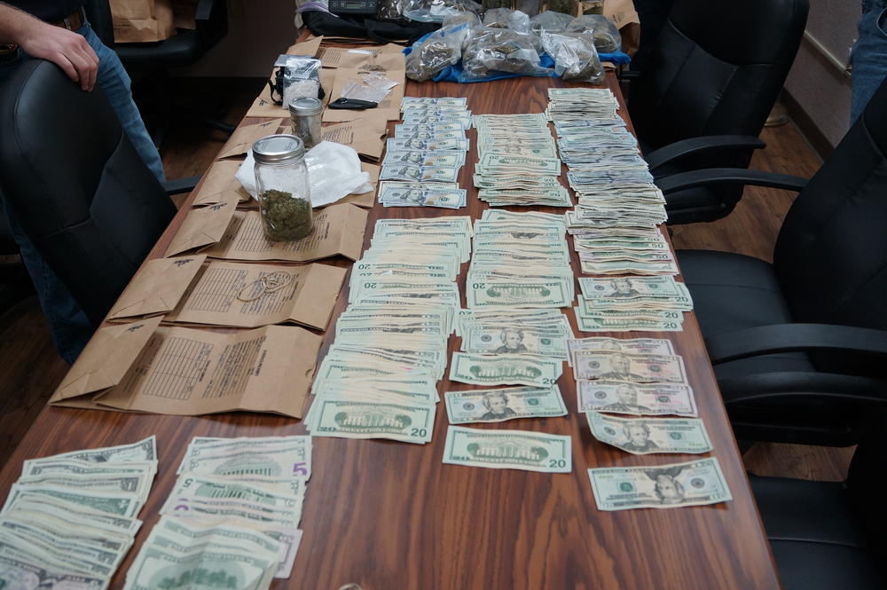 Confiscated Marijuana, cash, and ICE
