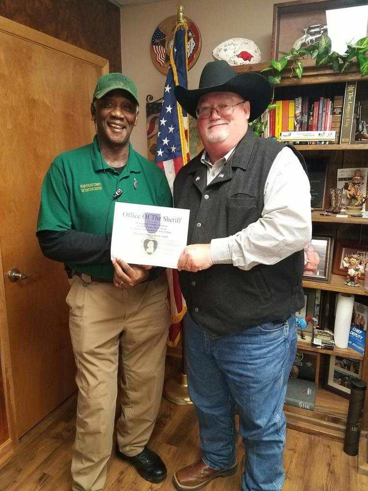 Detention Officer Jimmy Smith receiving purple heart