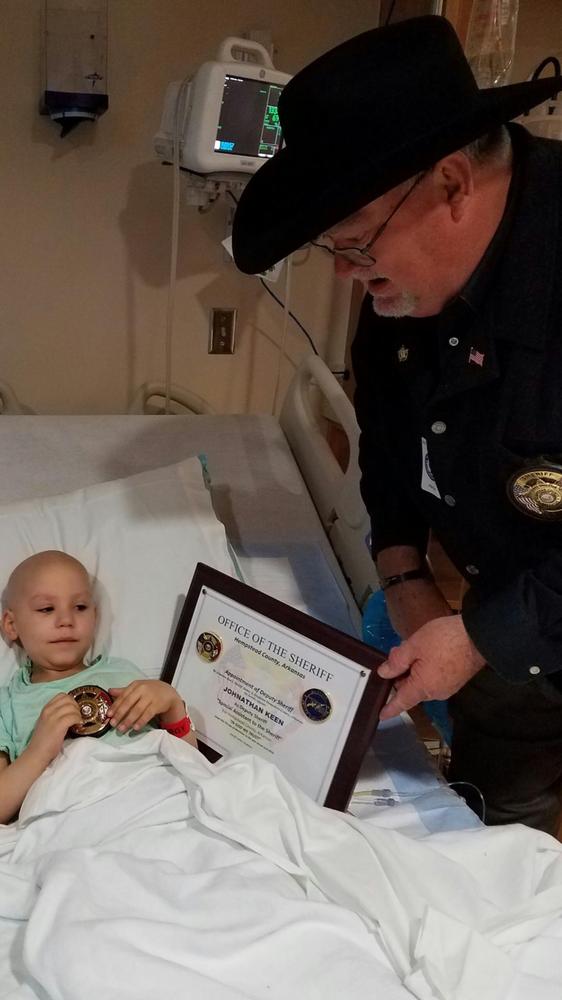 Sheriff Singleton appointing Jonathan as his youngest deputy