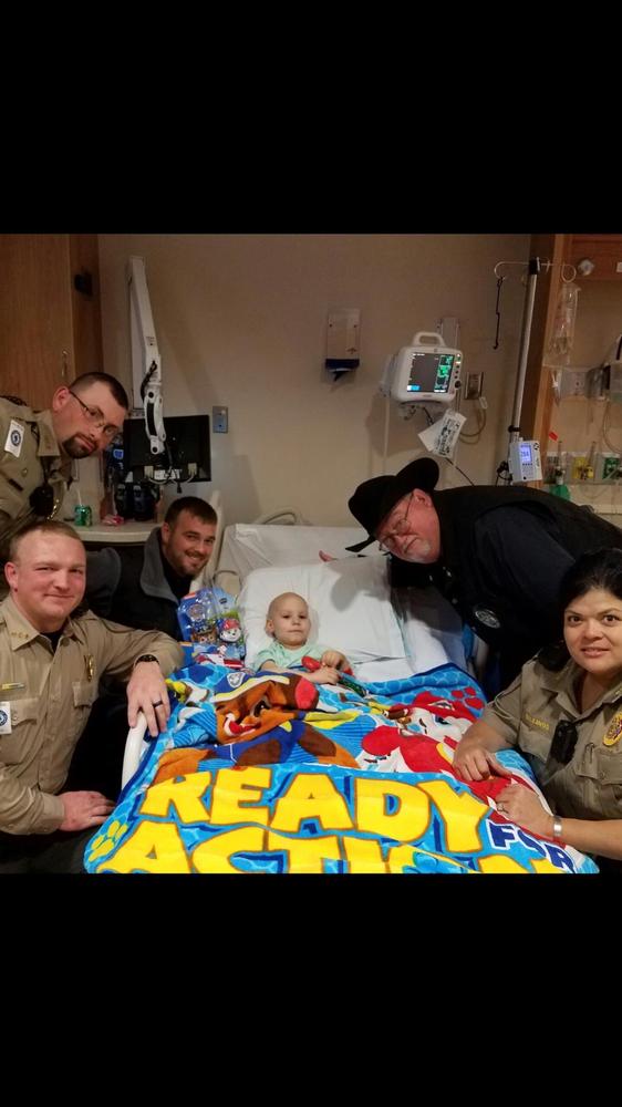 Sheriff's Office staff with Jonathan in the hospital