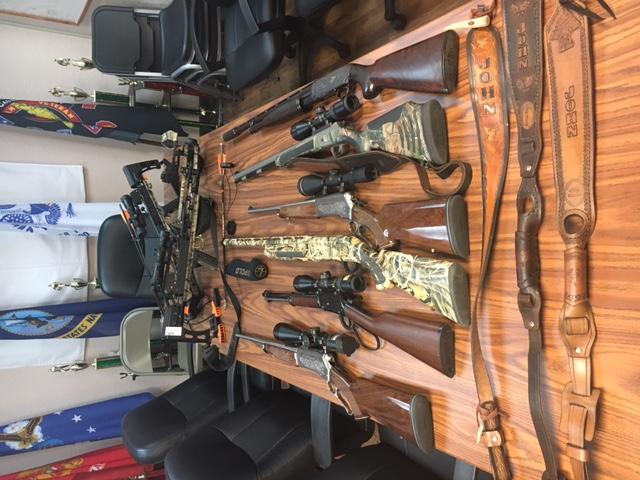 firearms laying on a table