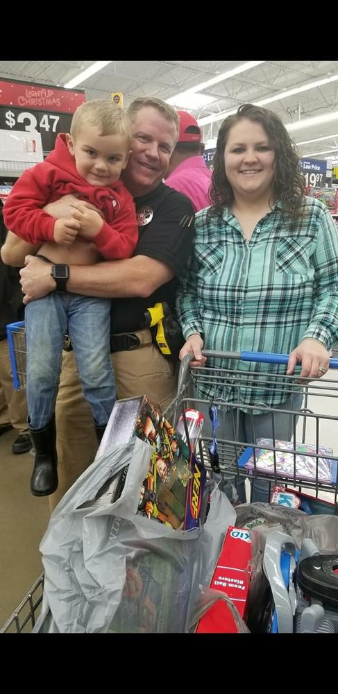 Woman and child with an Officer