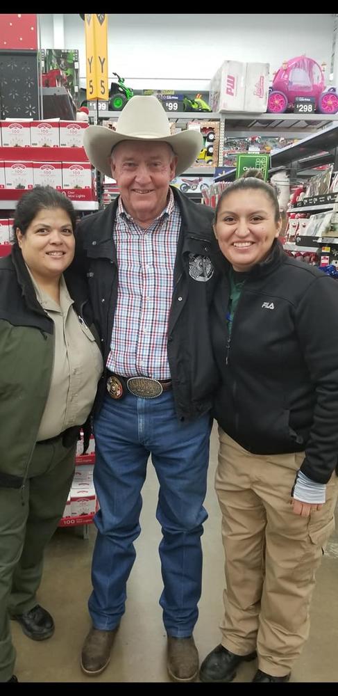 Officers at a Christmas event in walmart