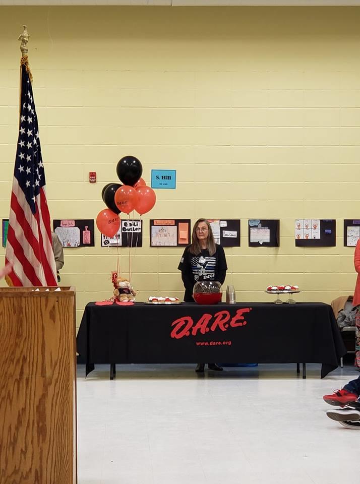 Woman standing at snack table